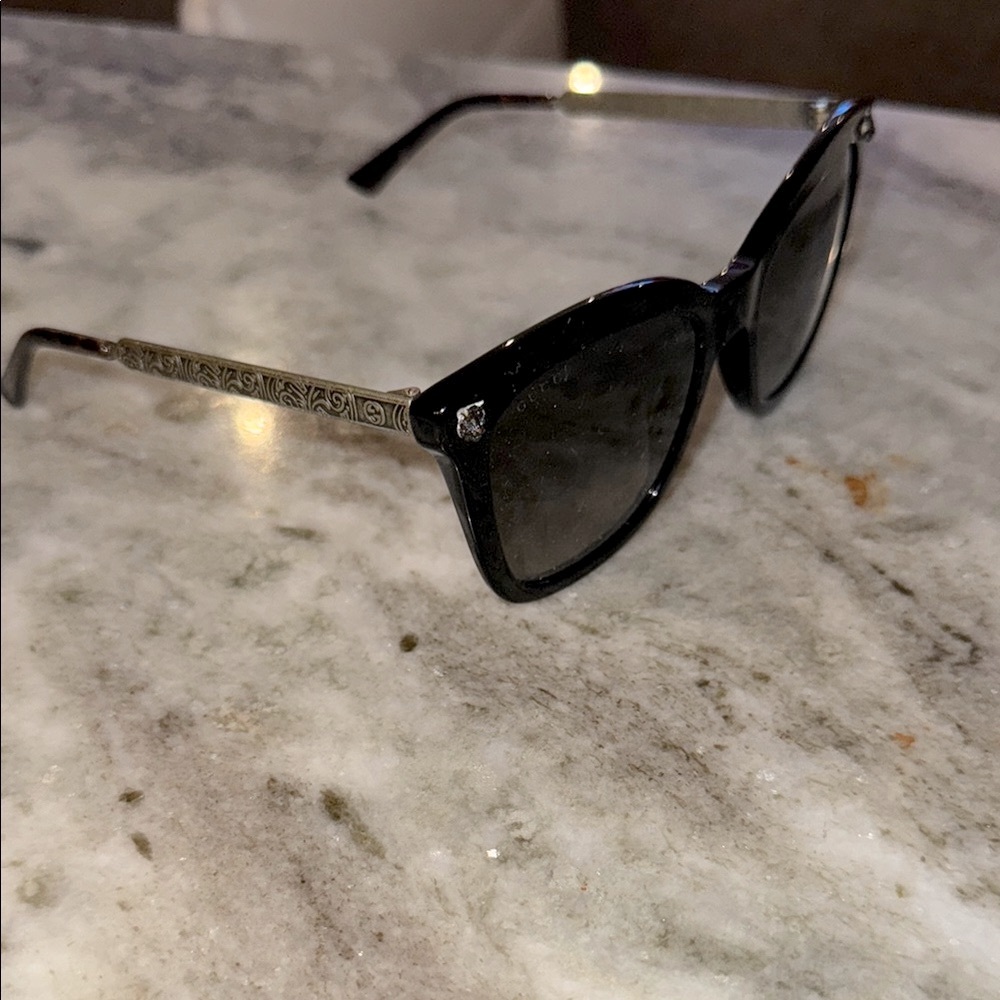 Authentic Black Cat Eye Tiger Gucci Sunglasses with case. Gold features on sides
